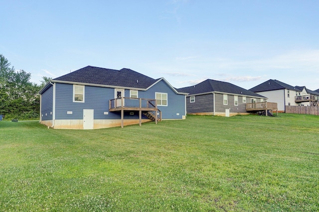 753 S Elm Rd, Marshfield, MO 65706 - rear view of property with a wooden deck and a lawn
