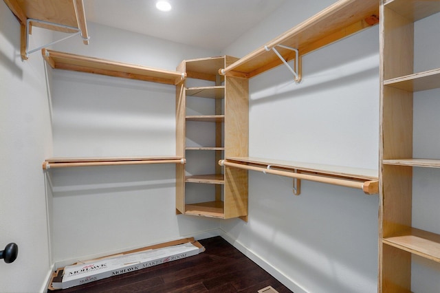 753 S Elm Rd, Marshfield, MO 65706 - walk in closet featuring dark wood-type flooring
