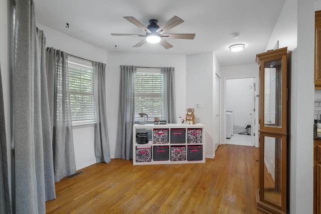 103 Fawn Trl, Neosho, MO 64850 - bedroom with light wood-style floors and ceiling fan