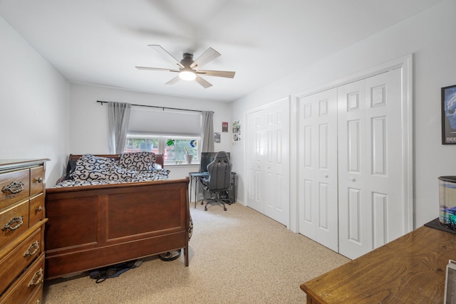 103 Fawn Trl, Neosho, MO 64850 - bedroom featuring multiple closets, a desk, carpet flooring, and a ceiling fan