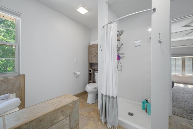 103 Fawn Trl, Neosho, MO 64850 - bathroom featuring toilet and a tile shower