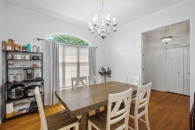 103 Fawn Trl, Neosho, MO 64850 - dining room with a chandelier, ornamental molding, and light wood-style flooring