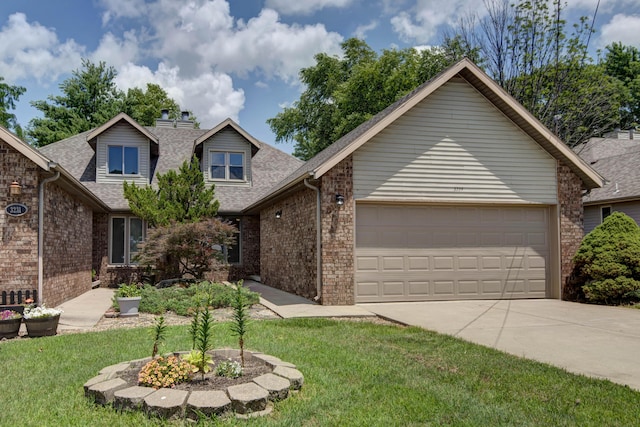 3229 W Hanover St, Springfield, MO 65807 - view of front of property with brick siding, driveway, a garage, a shingled roof, and a front lawn