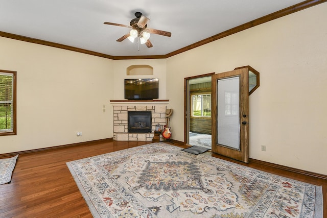 760 S 21st Ave, Ozark, MO 65721 - living room with a ceiling fan, a fireplace, crown molding, and wood finished floors