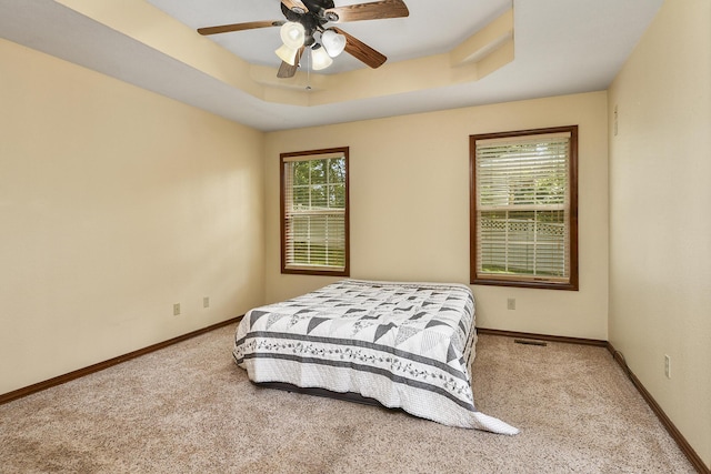 760 S 21st Ave, Ozark, MO 65721 - carpeted bedroom with a raised ceiling and a ceiling fan