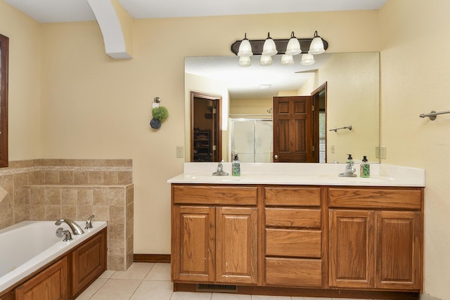 760 S 21st Ave, Ozark, MO 65721 - full bathroom with a shower stall, double vanity, a garden tub, and tile patterned flooring