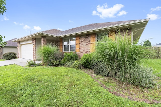 3262 E Colonial St, Republic, MO 65738 - ranch-style home with brick siding, driveway, a front yard, and an attached garage