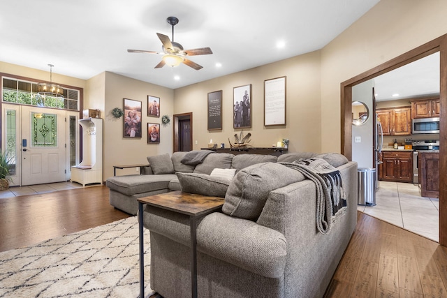 301 N Bonda Way, Nixa, MO 65714 - living room featuring light wood-style floors, recessed lighting, and ceiling fan