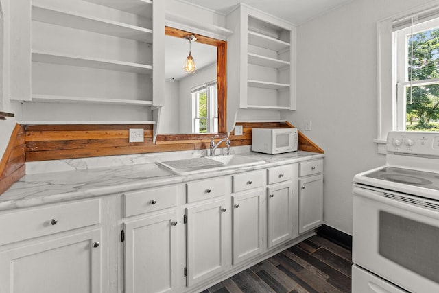 2101 N Main Ave, Springfield, MO 65803 - kitchen with white appliances, open shelves, dark wood-style flooring, white cabinetry, and healthy amount of natural light