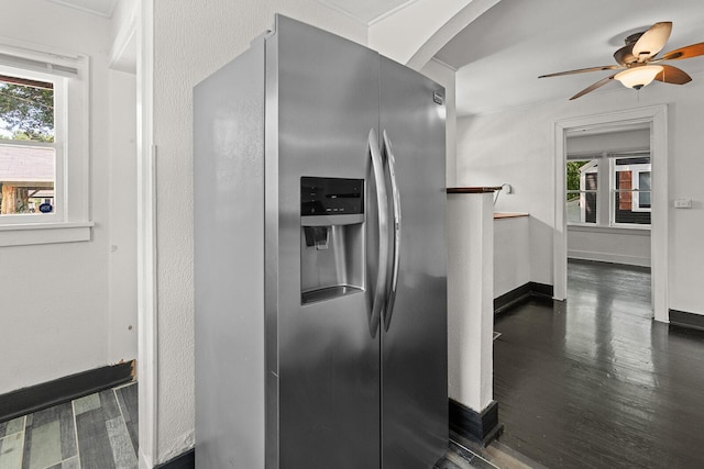 2101 N Main Ave, Springfield, MO 65803 - kitchen featuring stainless steel refrigerator with ice dispenser, arched walkways, a ceiling fan, and dark wood finished floors