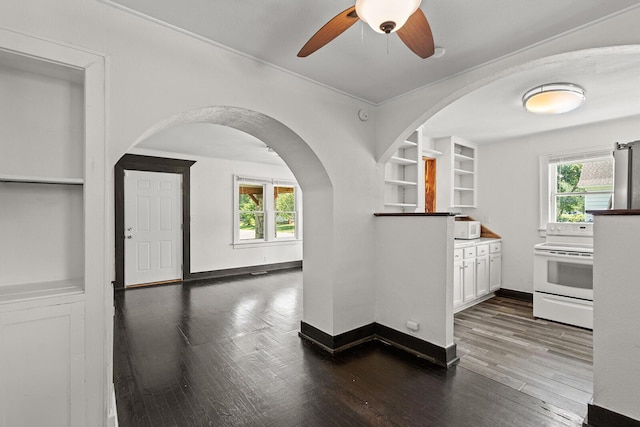 2101 N Main Ave, Springfield, MO 65803 - kitchen with white appliances, wood finished floors, plenty of natural light, and crown molding