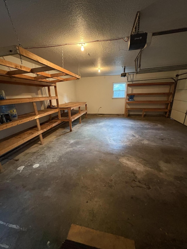 311 Crestwood Dr, Neosho, MO 64850 - garage featuring a garage door opener