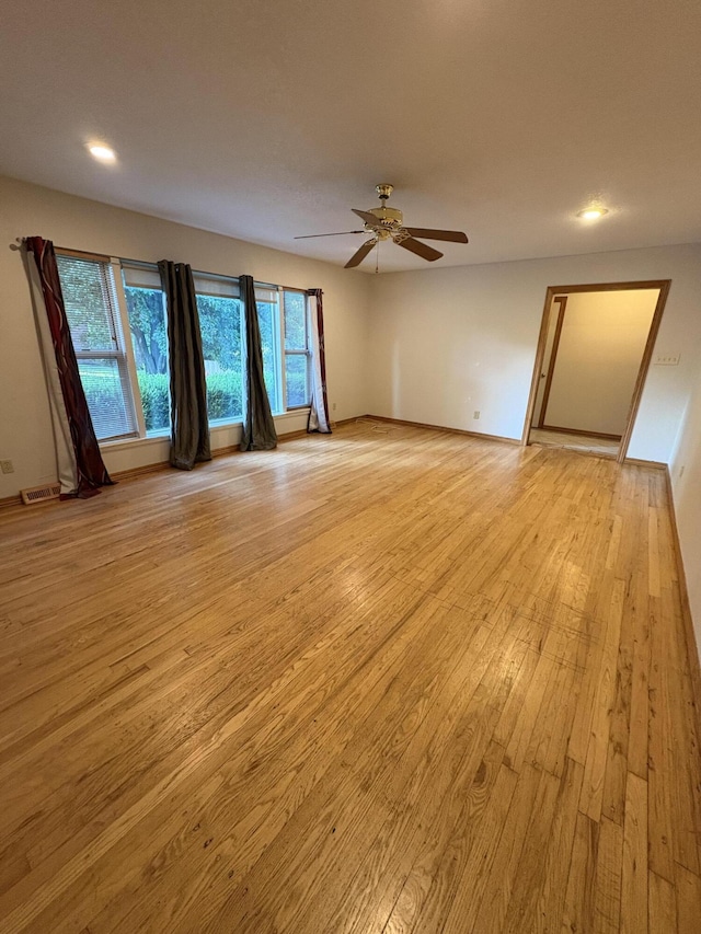 311 Crestwood Dr, Neosho, MO 64850 - unfurnished room featuring light wood-style flooring, ceiling fan, and recessed lighting