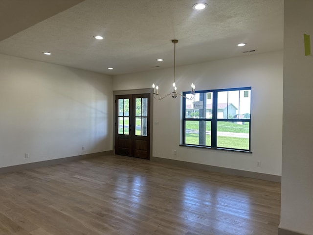 1988 Morris Rd Unit B, Mountain Grove, MO 65711 - empty room featuring wood finished floors, recessed lighting, and a chandelier