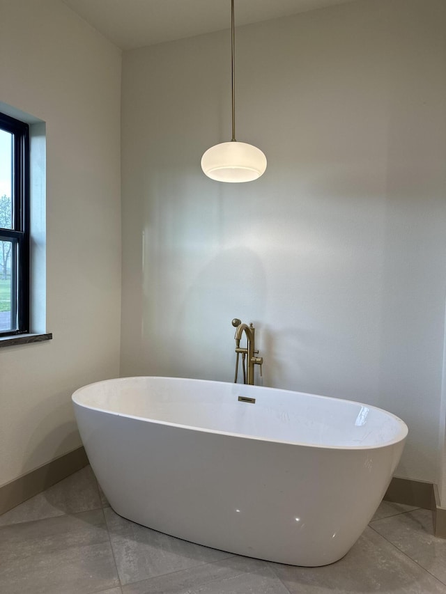 1988 Morris Rd Unit B, Mountain Grove, MO 65711 - full bathroom with baseboards and a freestanding bath