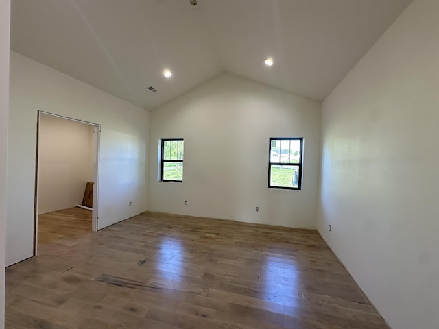 1988 Morris Rd Unit B, Mountain Grove, MO 65711 - spare room featuring lofted ceiling, wood finished floors, and recessed lighting
