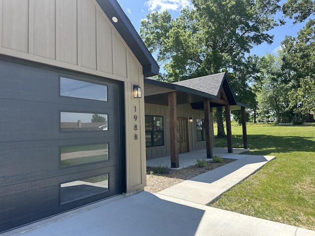 1988 Morris Rd Unit B, Mountain Grove, MO 65711 - property entrance featuring a lawn, a porch, roof with shingles, and board and batten siding