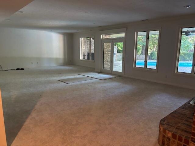 5043 S Glenhaven Ave, Springfield, MO 65804 - unfurnished living room featuring carpet