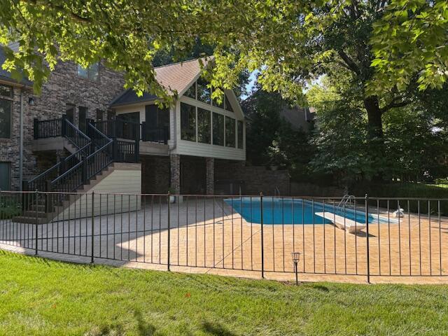 5043 S Glenhaven Ave, Springfield, MO 65804 - view of swimming pool featuring a patio, a diving board, and stairs