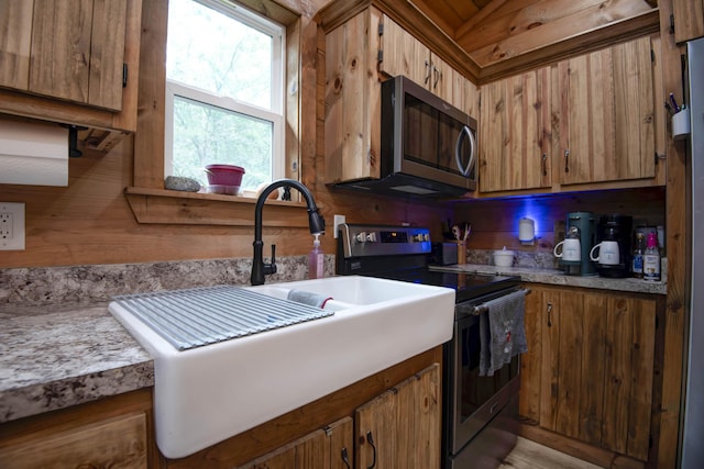 119 Allison Bnd, Lampe, MO 65681 - kitchen featuring stainless steel appliances, brown cabinetry, and light countertops