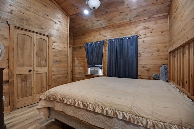 119 Allison Bnd, Lampe, MO 65681 - bedroom with wood finished floors, wood ceiling, vaulted ceiling, wooden walls, and cooling unit