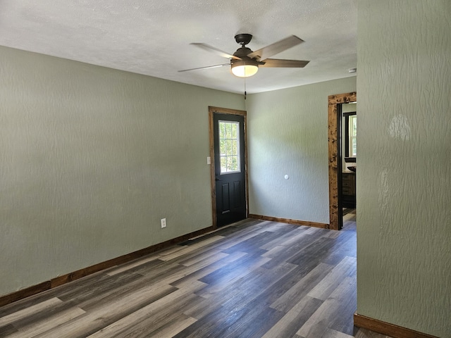 401 Walnut St, Ava, MO 65608 - unfurnished room featuring wood finished floors, a ceiling fan, and a textured ceiling