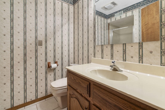 4059 E Linwood St, Springfield, MO 65809 - full bathroom with vanity, tile patterned floors, and a shower with shower door