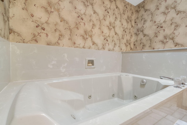 4059 E Linwood St, Springfield, MO 65809 - bathroom featuring a whirlpool tub and tile patterned floors