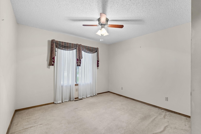 4059 E Linwood St, Springfield, MO 65809 - carpeted empty room featuring ceiling fan and a textured ceiling