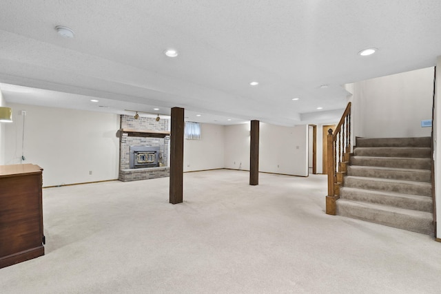 4059 E Linwood St, Springfield, MO 65809 - finished below grade area featuring carpet flooring, stairway, recessed lighting, and a brick fireplace