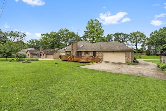 4059 E Linwood St, Springfield, MO 65809 - view of front of property with driveway, an attached garage, a front lawn, a wooden deck, and brick siding