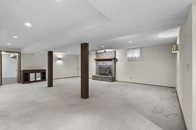 4059 E Linwood St, Springfield, MO 65809 - finished below grade area featuring a brick fireplace, carpet flooring, recessed lighting, and a textured ceiling