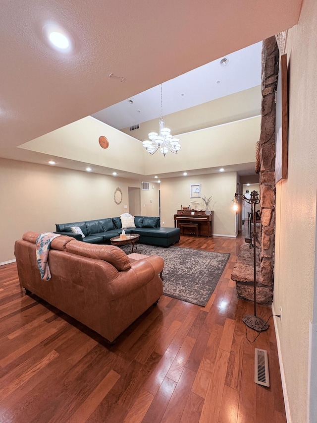 2412 S Camber Ave, Springfield, MO 65809 - living room with dark wood-type flooring, a chandelier, and recessed lighting