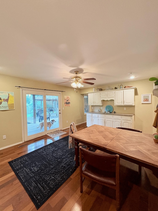 2412 S Camber Ave, Springfield, MO 65809 - dining room with wood finished floors and a ceiling fan