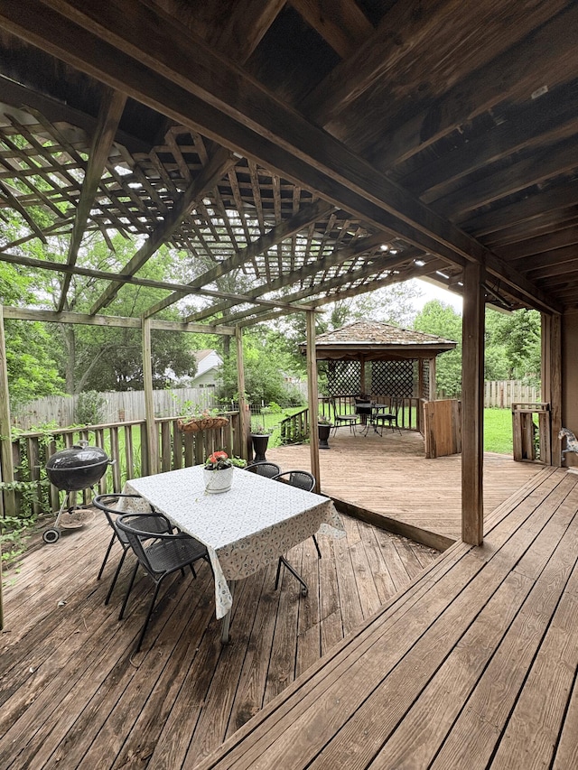 2412 S Camber Ave, Springfield, MO 65809 - wooden terrace featuring outdoor dining space