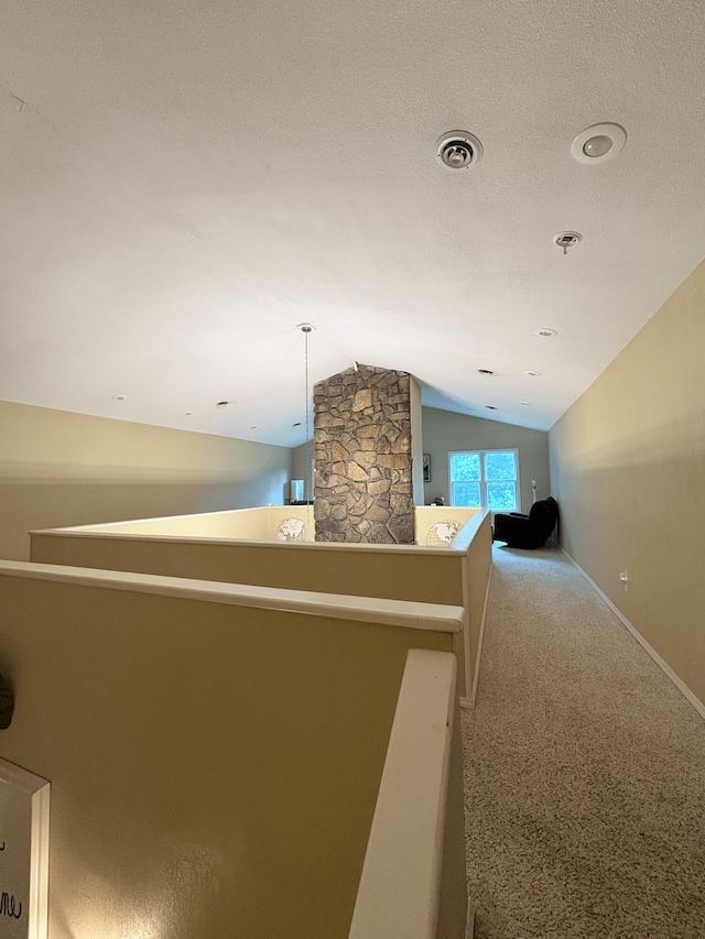 2412 S Camber Ave, Springfield, MO 65809 - hall with vaulted ceiling, an upstairs landing, and carpet floors