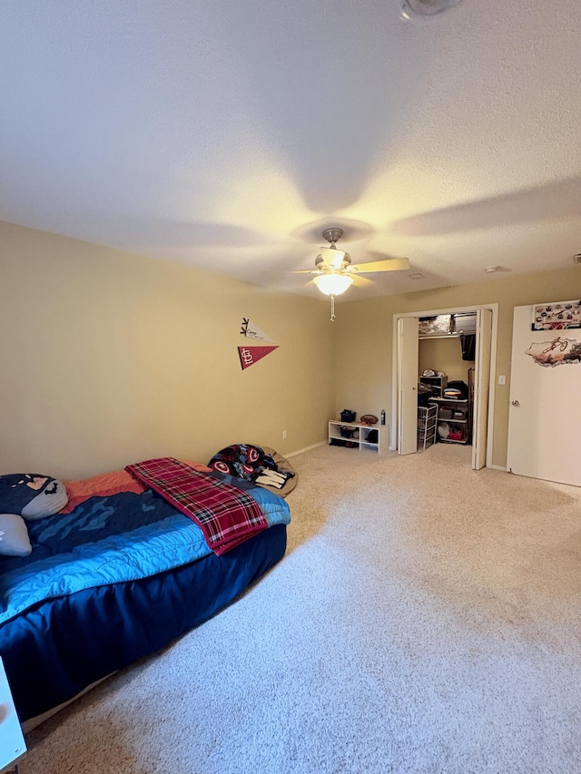 2412 S Camber Ave, Springfield, MO 65809 - carpeted bedroom with a ceiling fan and a textured ceiling