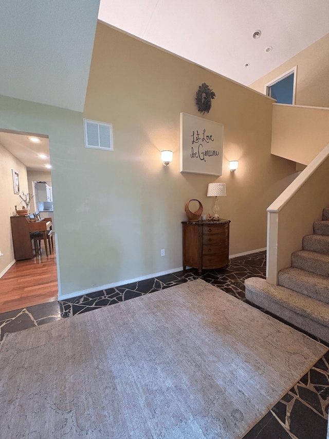2412 S Camber Ave, Springfield, MO 65809 - living area featuring stairs, wood finished floors, and recessed lighting