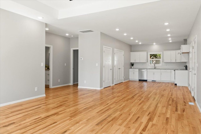 3001 E Colonial Ct, Republic, MO 65738 - unfurnished living room with light wood-type flooring and recessed lighting