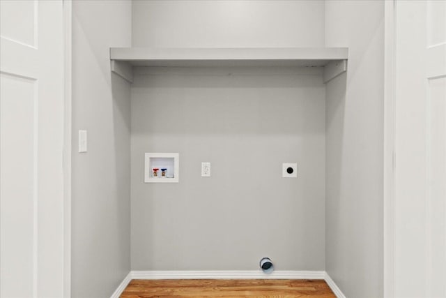 3001 E Colonial Ct, Republic, MO 65738 - laundry room featuring hookup for an electric dryer, hookup for a washing machine, and wood finished floors