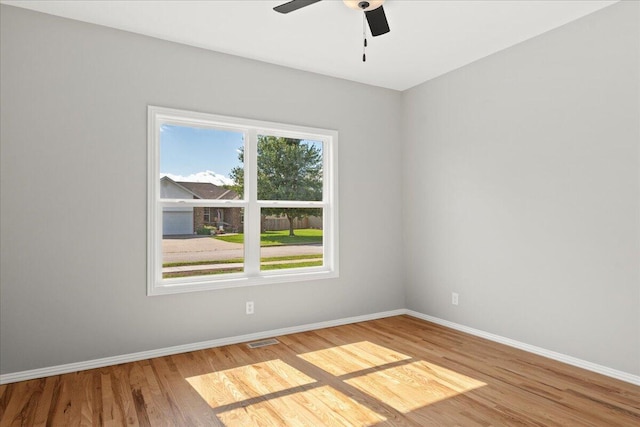 3001 E Colonial Ct, Republic, MO 65738 - spare room with wood finished floors and ceiling fan