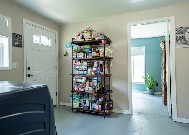 1050 S Glenn Ave, Springfield, MO 65802 - entryway with baseboards and finished concrete flooring