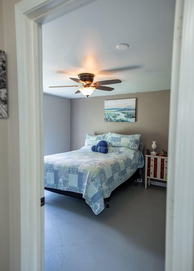 1050 S Glenn Ave, Springfield, MO 65802 - bedroom with finished concrete flooring and a ceiling fan