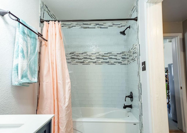 1050 S Glenn Ave, Springfield, MO 65802 - full bath featuring shower / bath combination with curtain, vanity, and a textured wall