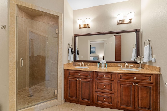 128 Mulligan Ct, Branson, MO 65616 - bathroom featuring a stall shower, tile patterned floors, and double vanity