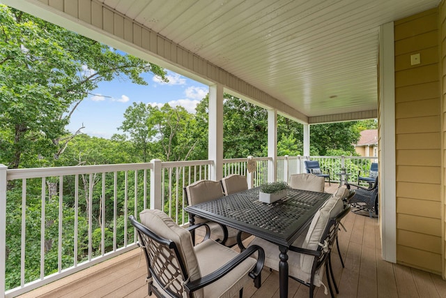 128 Mulligan Ct, Branson, MO 65616 - wooden deck featuring outdoor dining space