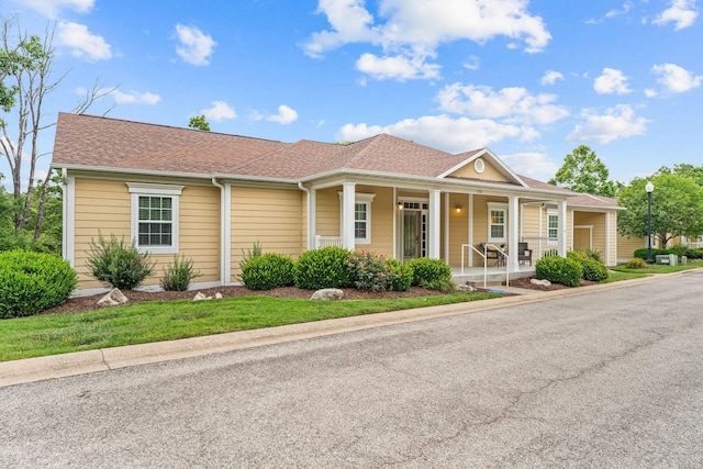 128 Mulligan Ct, Branson, MO 65616 - view of front of property with covered porch and roof with shingles