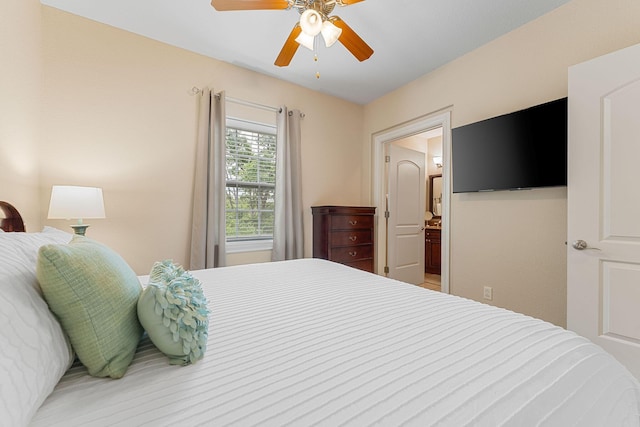 128 Mulligan Ct, Branson, MO 65616 - bedroom with a ceiling fan and ensuite bathroom