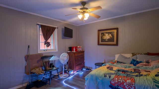 12 Riverbend Rd, Mammoth Spring, AR 72554 - bedroom with wood finished floors, ornamental molding, and a ceiling fan