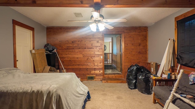 12 Riverbend Rd, Mammoth Spring, AR 72554 - carpeted bedroom featuring wood walls and a ceiling fan